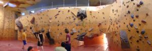 Indoor climbing at Der Kegel gym in Berlin: Built from a World War II shelter, offering top-notch facilities and challenging routes for all skill levels. Perfect for family adventure and fitness enthusiasts.