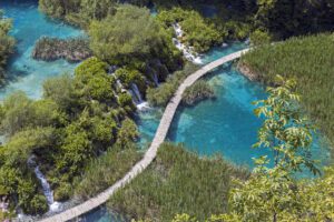 Waterfalls and wooden walkway at Plitvice Lakes National Park in Croatia