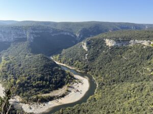The Ardèche river winding through limestone gorges seen from a viewpoint