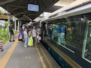 Family boarding a train in Surabaya, Surabaya, Indonesia